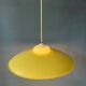 Danish mid-century suspension with opaline glass shade and yellow metal cover.