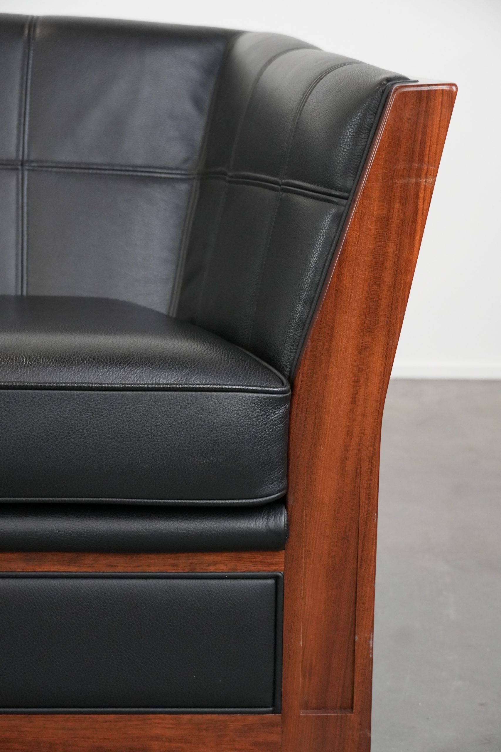 Art Deco  black leather 2.5-seater design sofa with beautiful woodwork