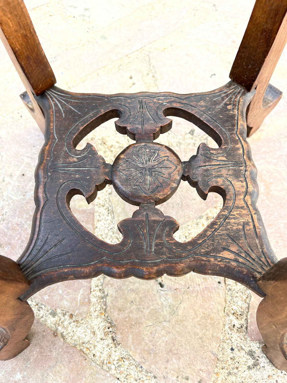 Old harness in wood with marble top