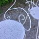 Salon de jardin 1 table 4 fauteuils en fer forgé blanc ancien.