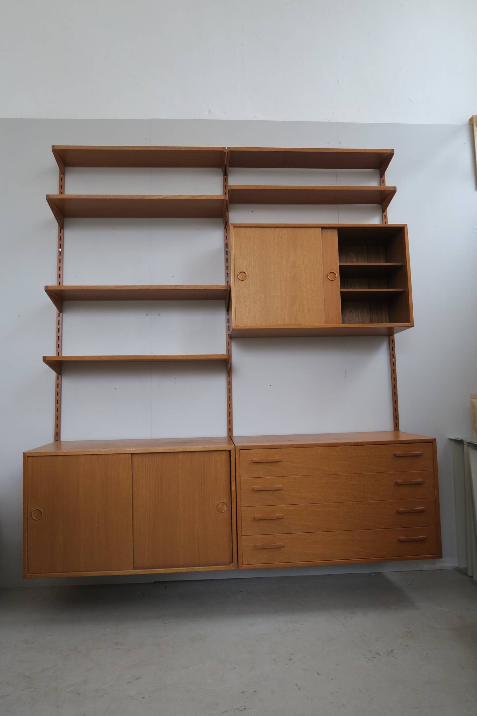 danish wall shelf unit in teak from the 60s by Kai Kristiansen