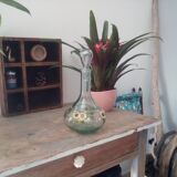 Old carafe bluish glass