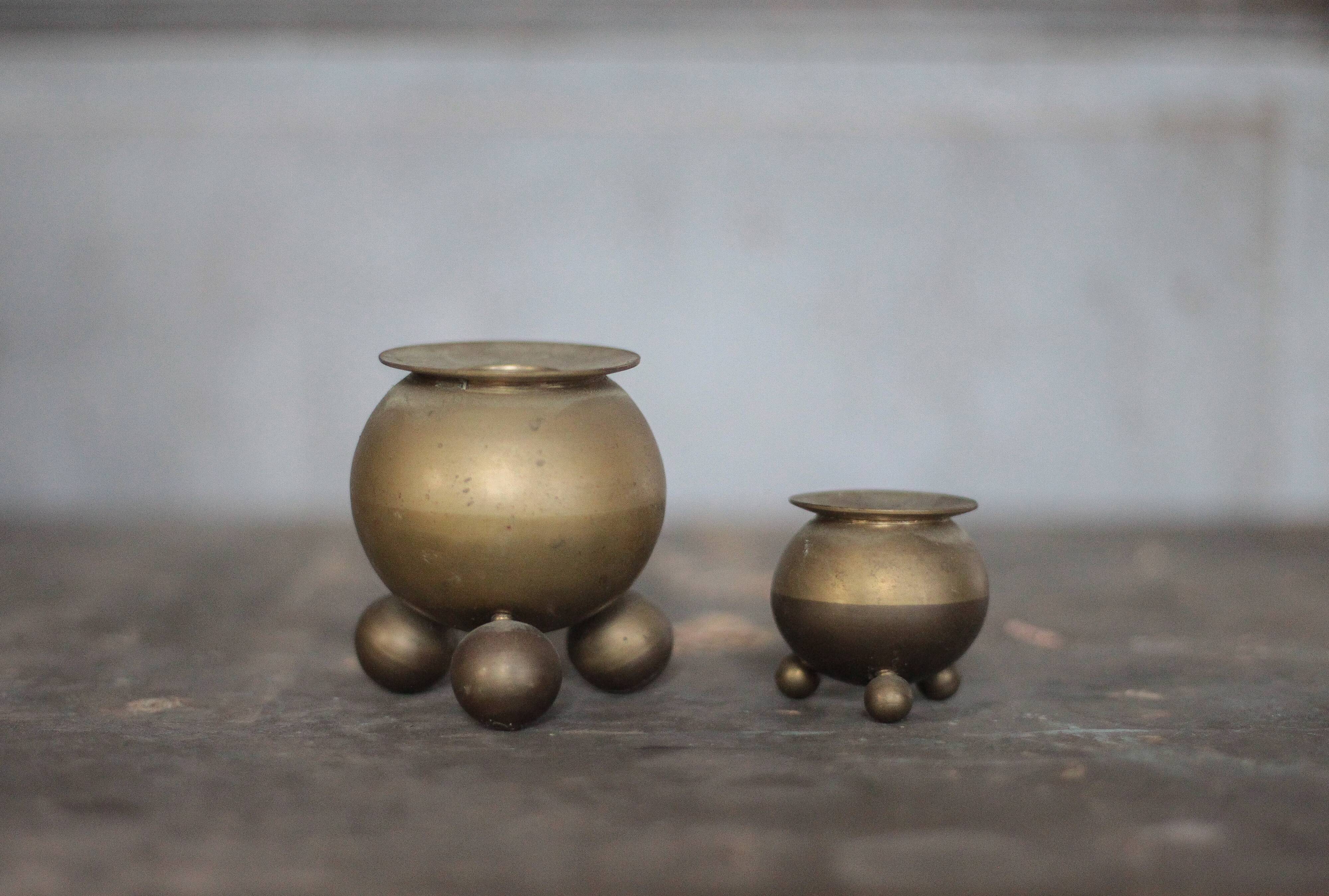 Pair of brass tripod candle holders, Gusum Bruck Sweden, candle holder.