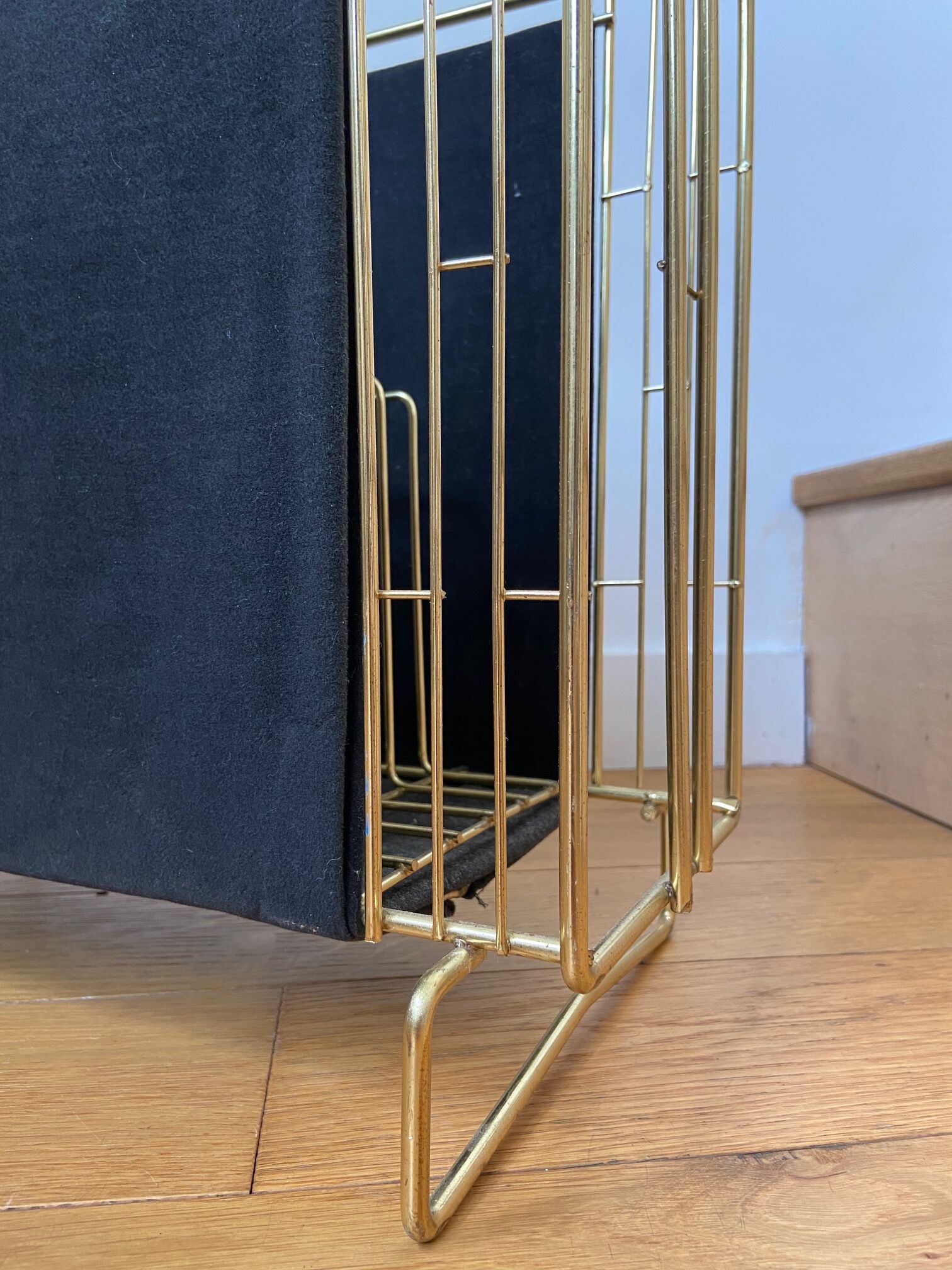 Gold metal, wood and black cotton magazine holder