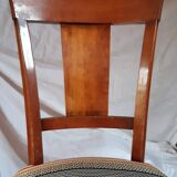 2 varnished solid wood chairs with "ethnic" padding