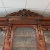 Glass-fronted walnut bookcase