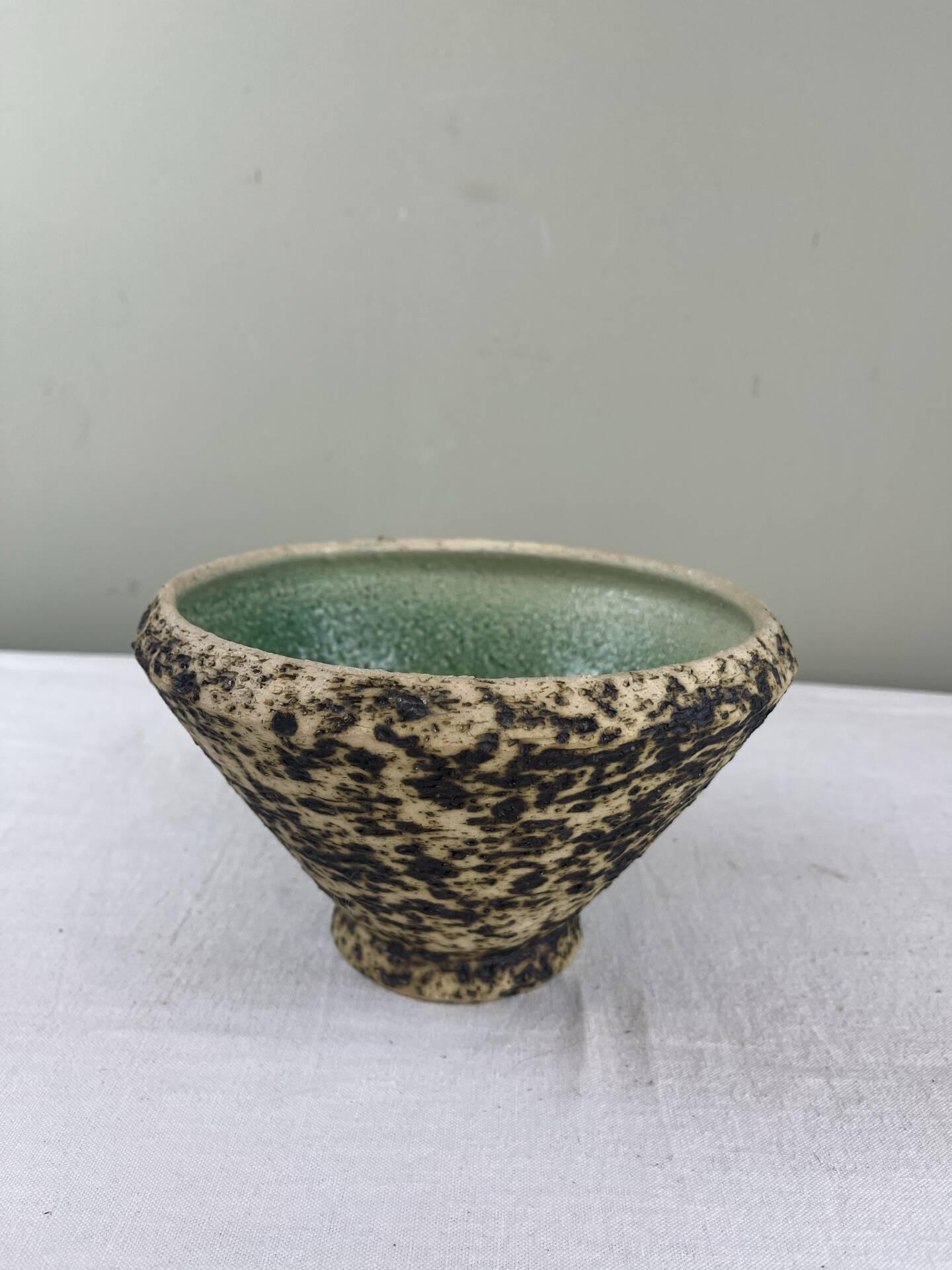 Celadon glazed stoneware bowl signed