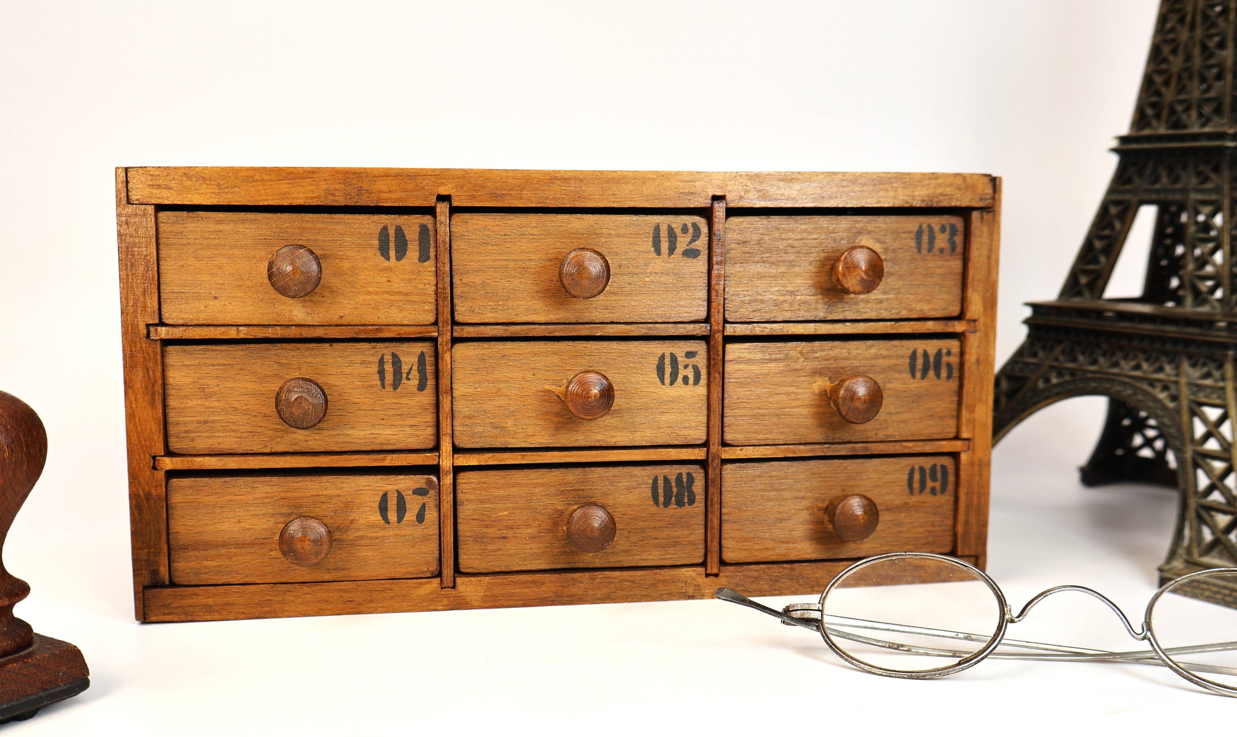 Small drawer unit, vintage wooden watchmaker's chest.