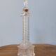Vendôme column perfume bottle in moulded glass, 19th century.