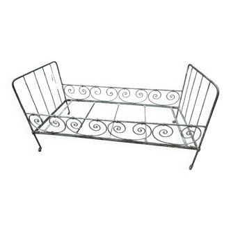 patinated wrought iron bedstead