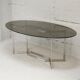 Table de Paul Legard, édition DOM, aluminium brossé et dalle elliptique de verre fumé, France, circa