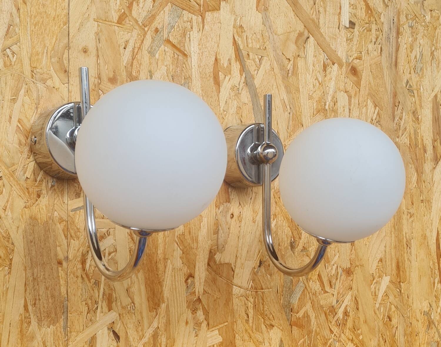 Pair of ball and chrome wall lights