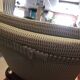 Rocking lounge chair made of fabric suitable for outdoor use.