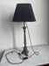 Old candle holder transformed into a lamp.