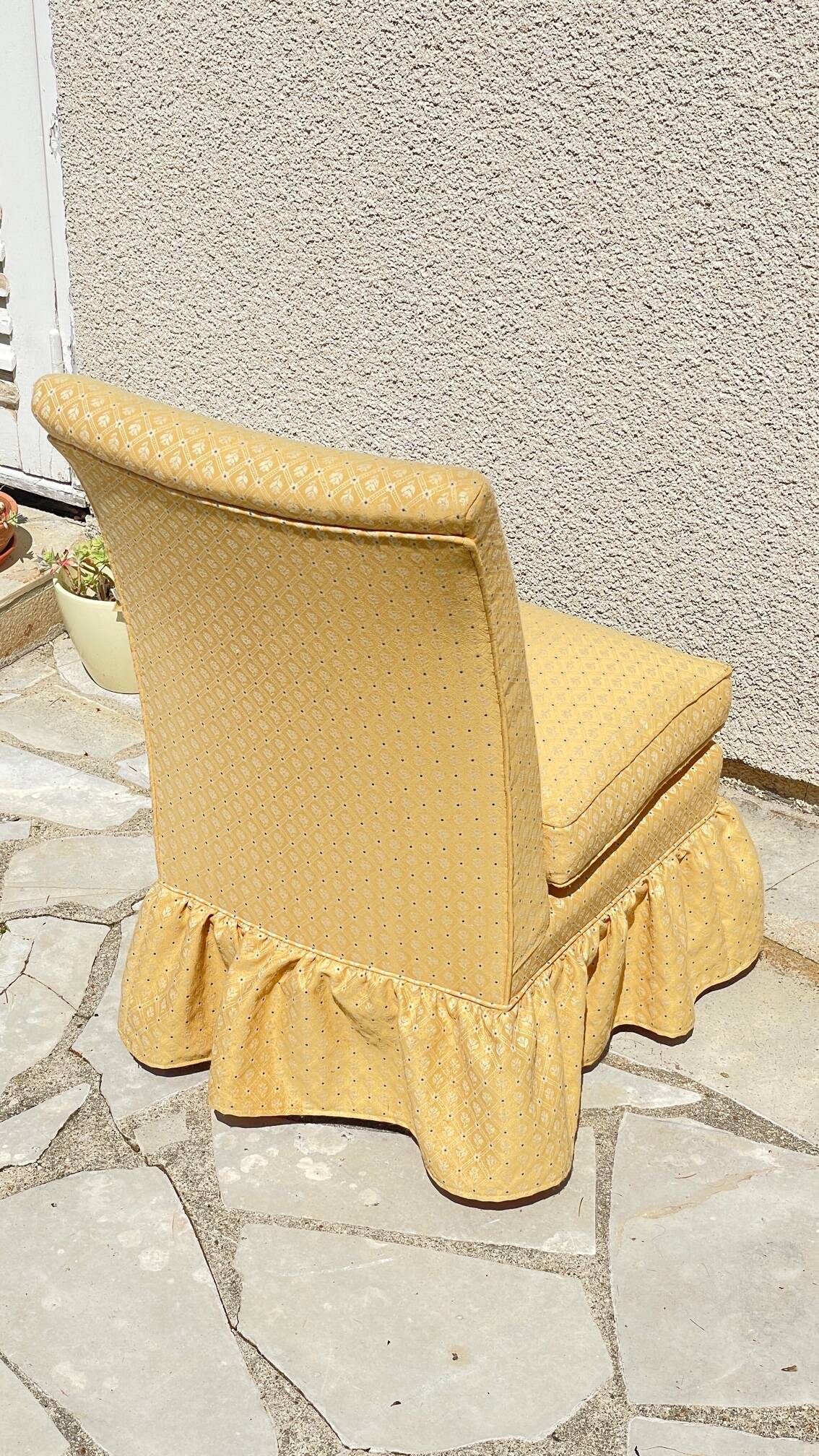 Vintage upholstered fabric toad armchair