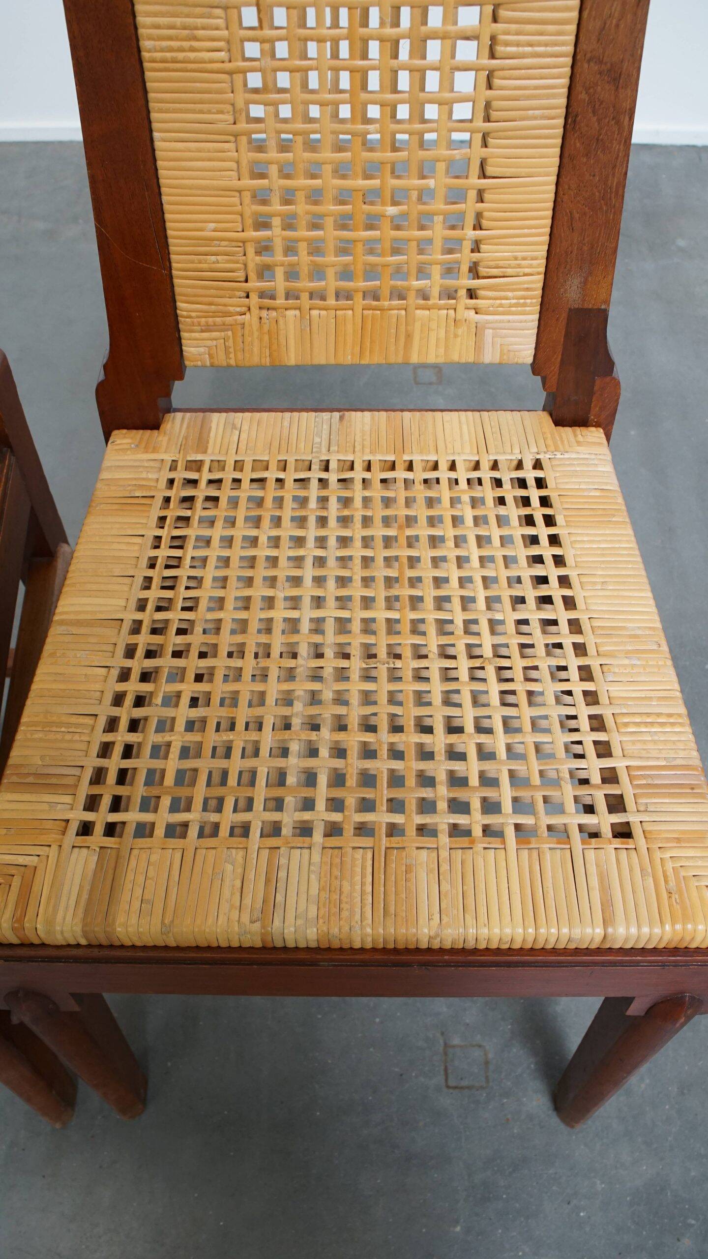 et of 6 wooden Art Deco design dining chairs with a wicker seat and backrest