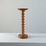 Vintage mid-century wooden candlestick, spool decoration from the 1970s.