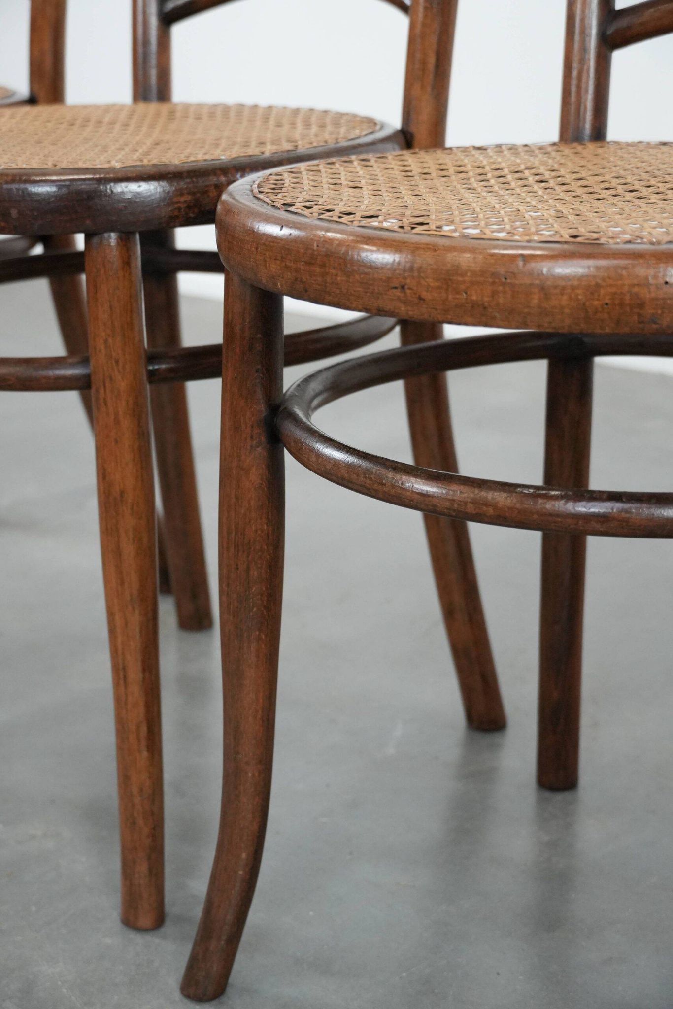 Set of 4 vintage bistro chairs Jacob & Josef Kohn Wien with a wicker seat