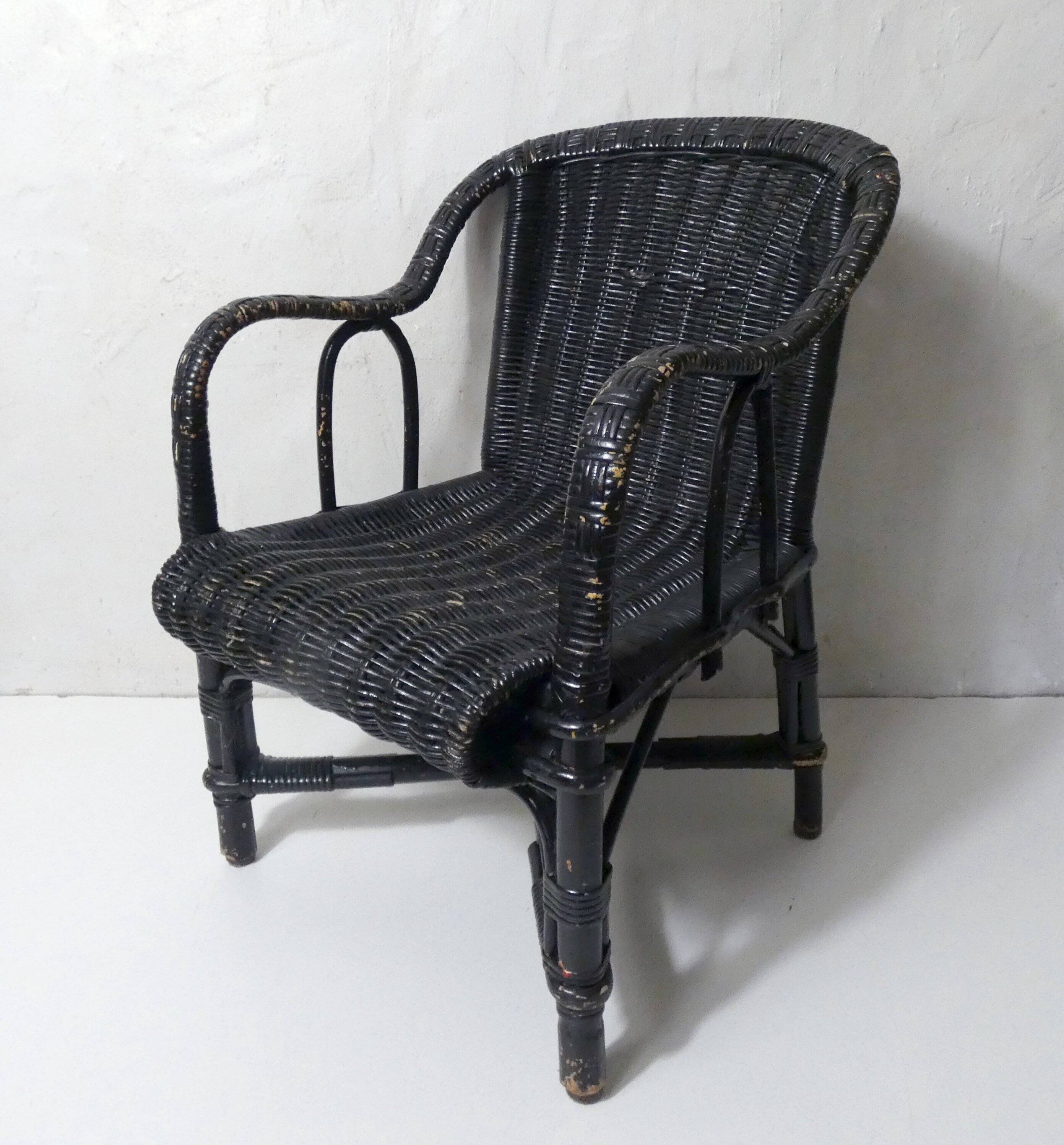 Vintage children's size rattan armchair