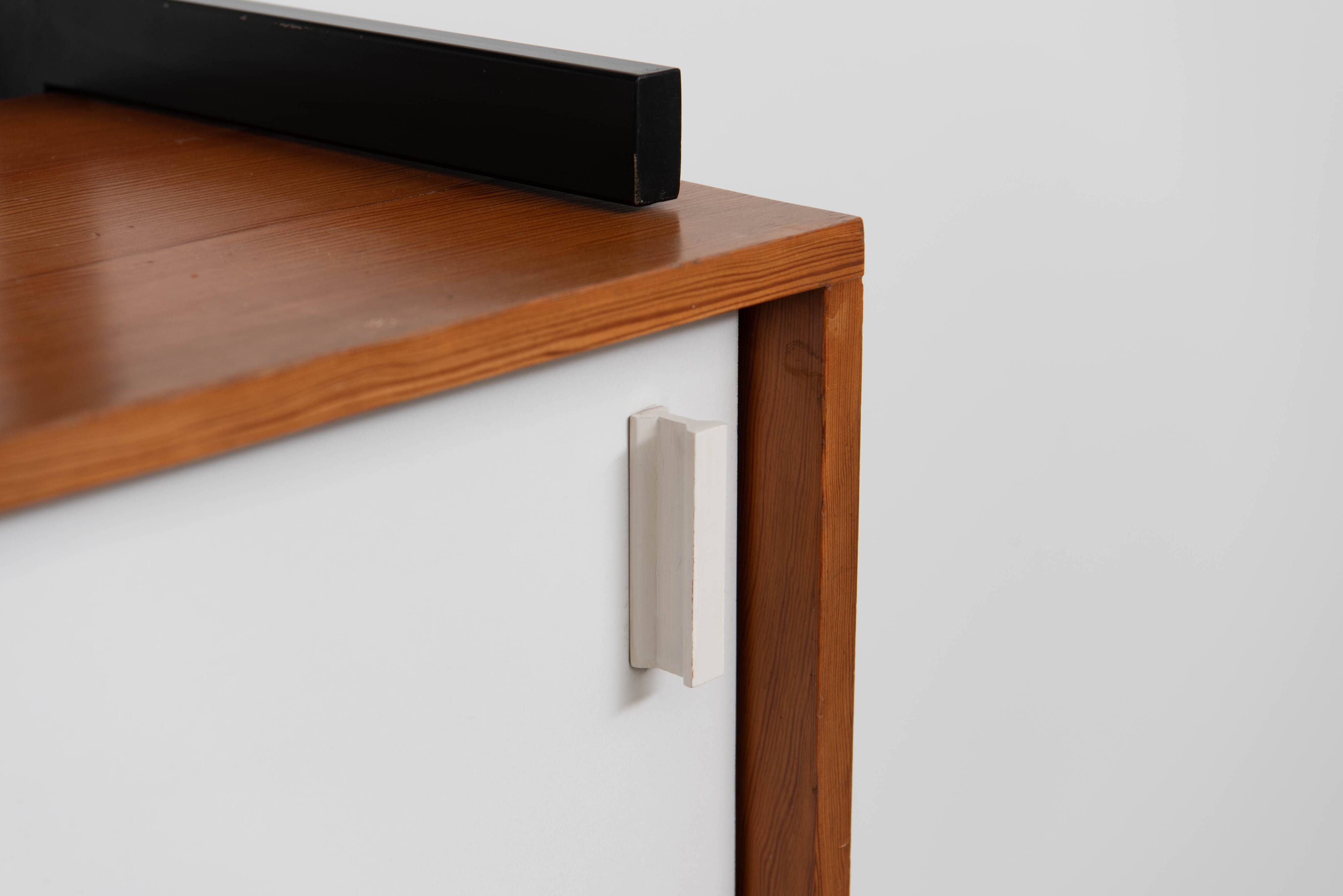 Teak wall shelf designed by Jul de Roover