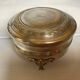 Antique silver-plated tripod box in the Louis XVI style.