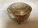 Antique silver-plated tripod box in the Louis XVI style.