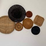 Wall composition of wicker baskets and trays.