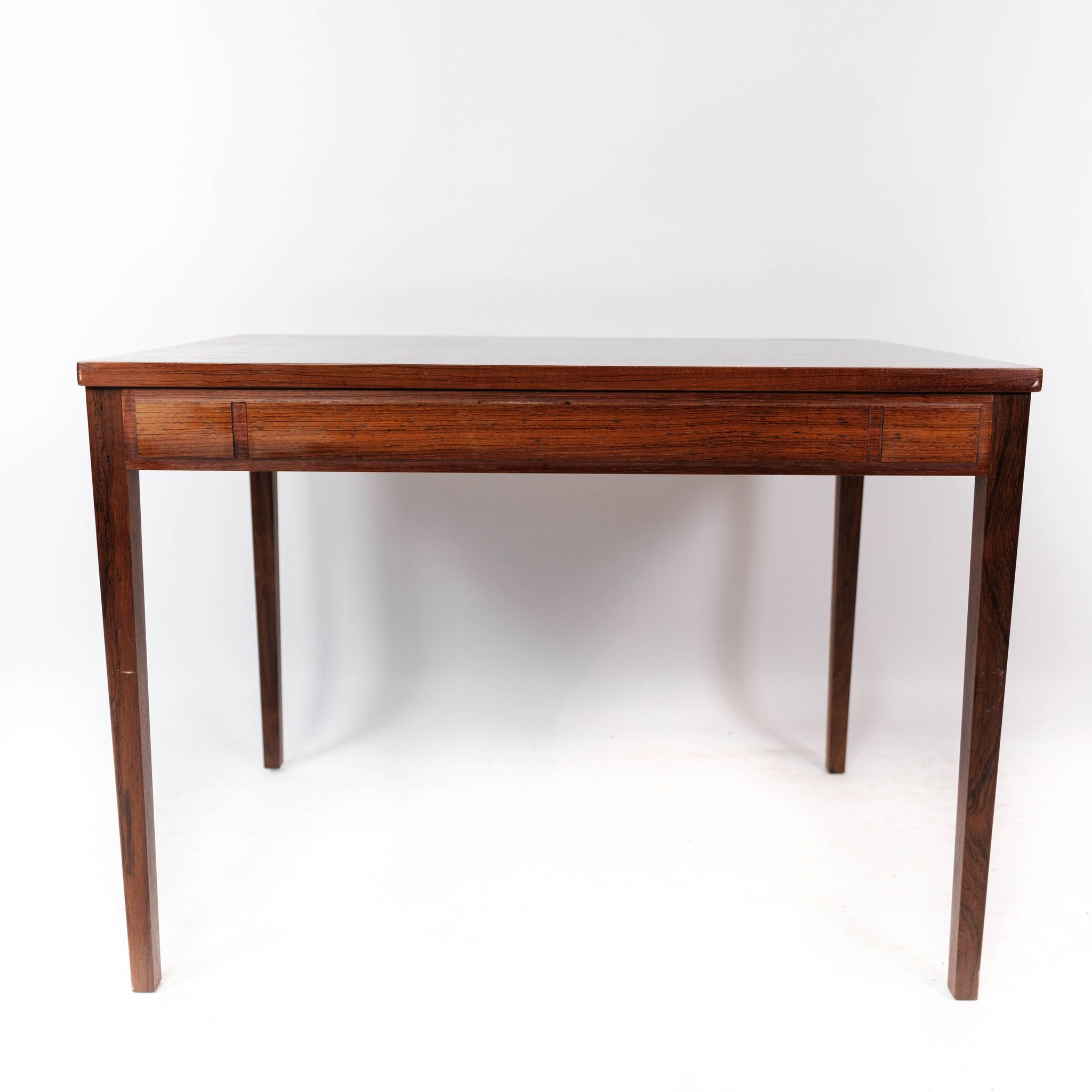 Side table in rosewood of danish design from the 1960s