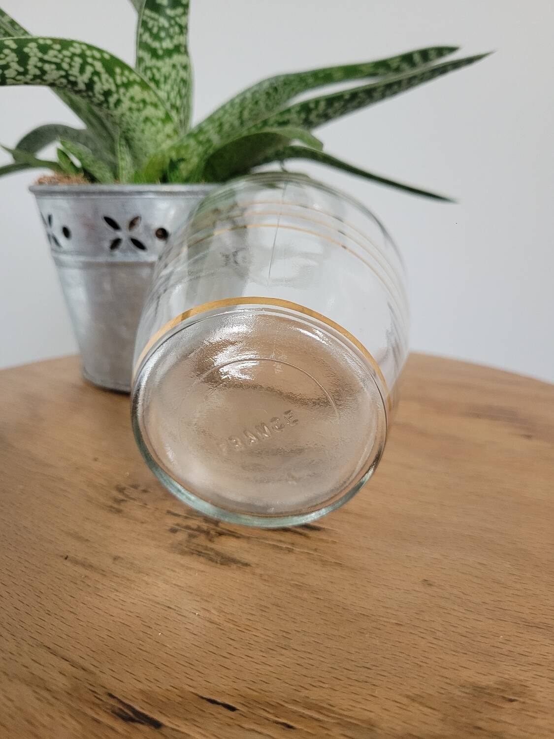 Small glass bottle with gold edges