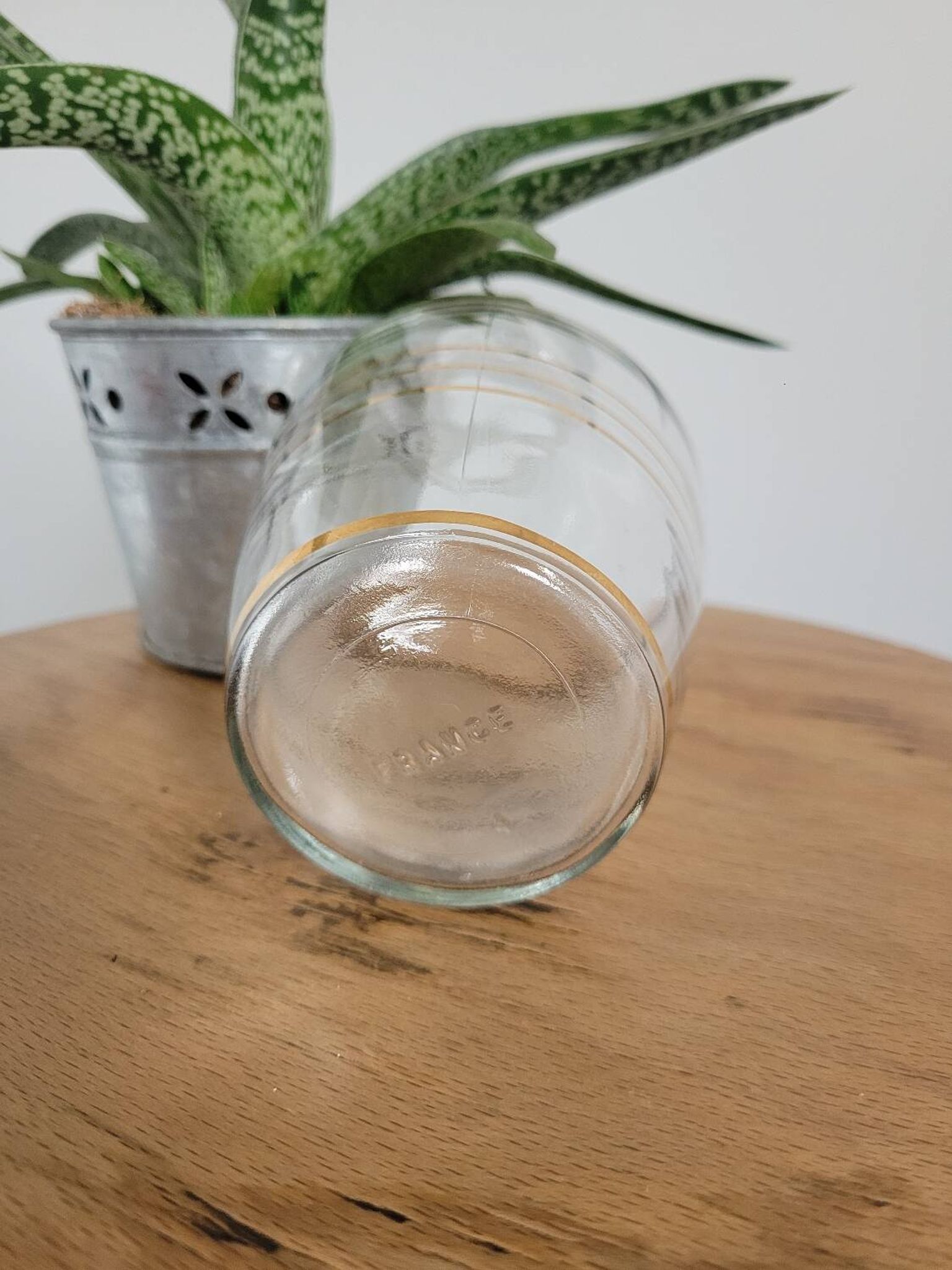 Small glass bottle with gold edges