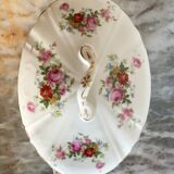 Antique porcelain soup bowl with floral decoration and golden border