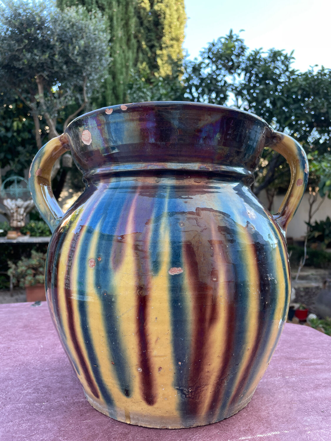 Old flower jar with two glazed earth handles