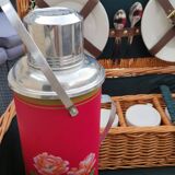 Picnic basket with white porcelain crockery