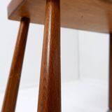 Table d'appoint vintage en bois massif sur roulettes