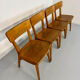Set of 4 vintage solid oak chairs, 1960s design with sculpted backrest.