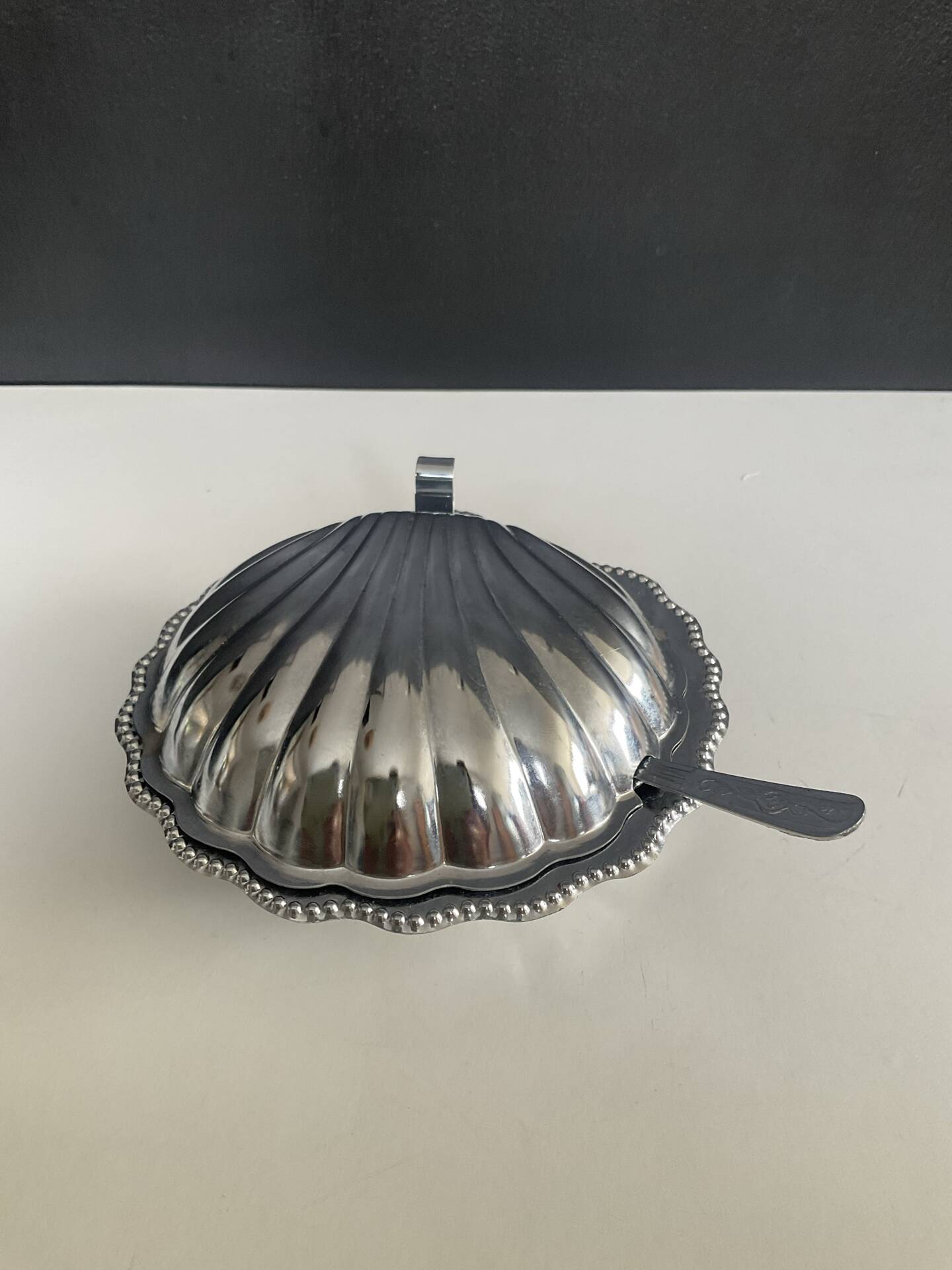 Vintage shell butter dish in stainless steel and blue glass