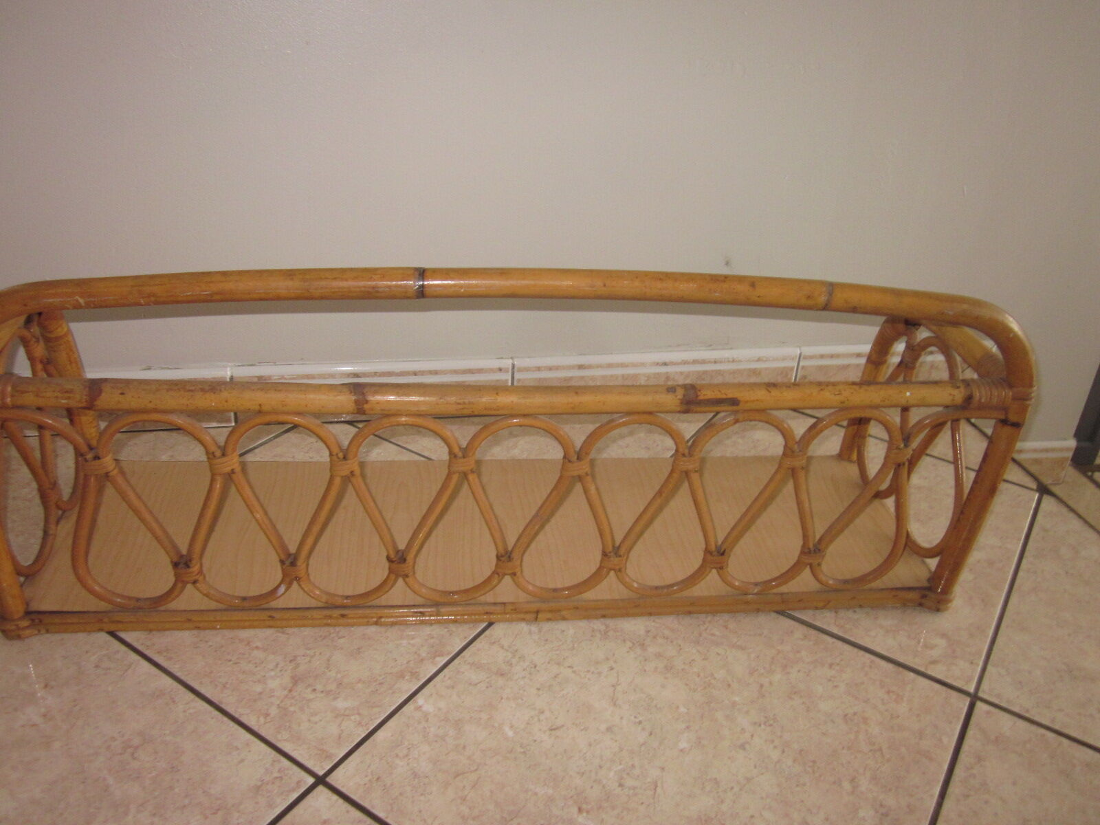 Shelf in rattan of the years 60