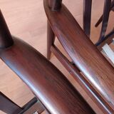 Pair of Danish Grete Jalk armchairs model Poul Jeppesen 56 in rosewood Denmark.