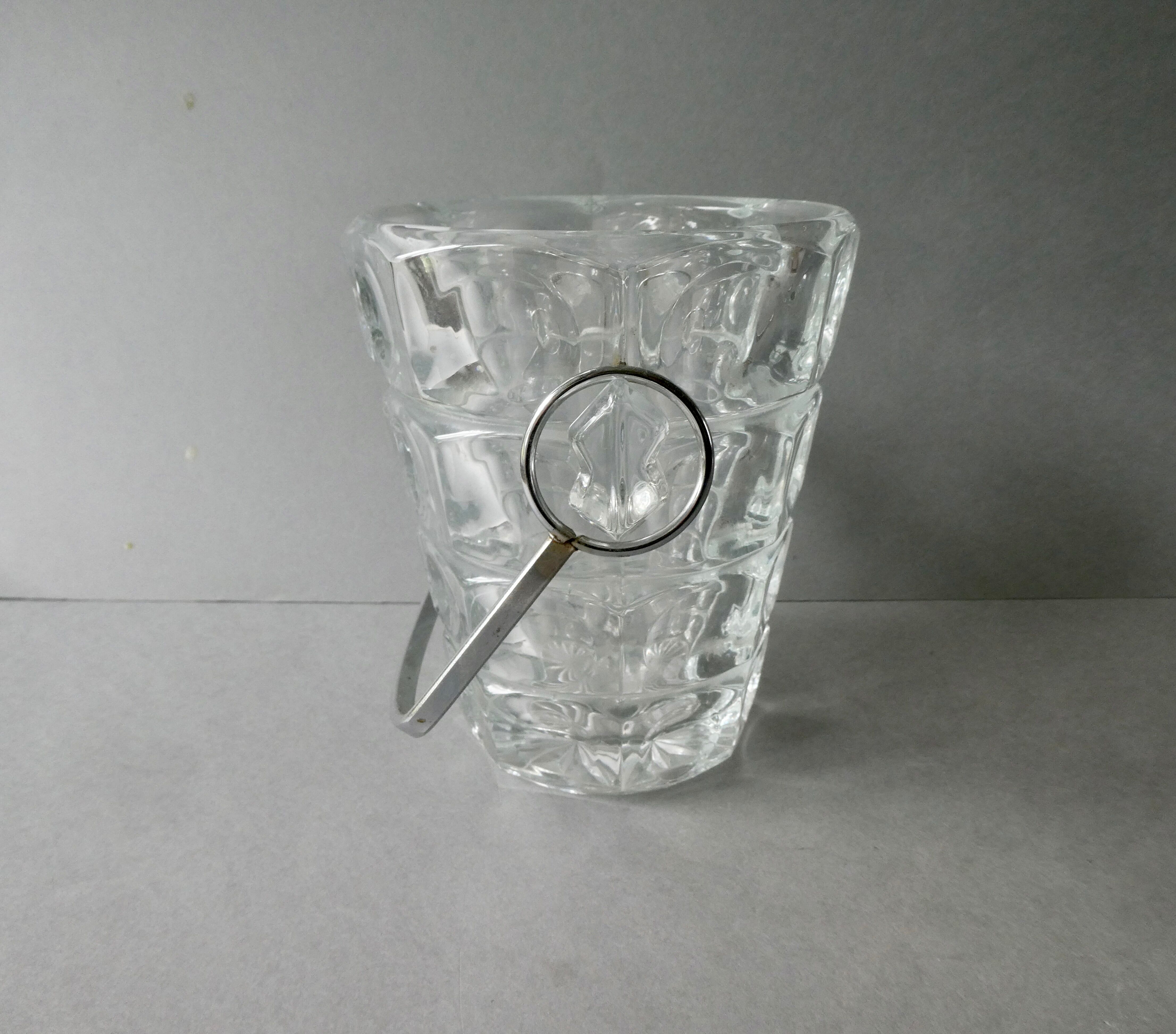 Cut glass ice bucket and its pliers