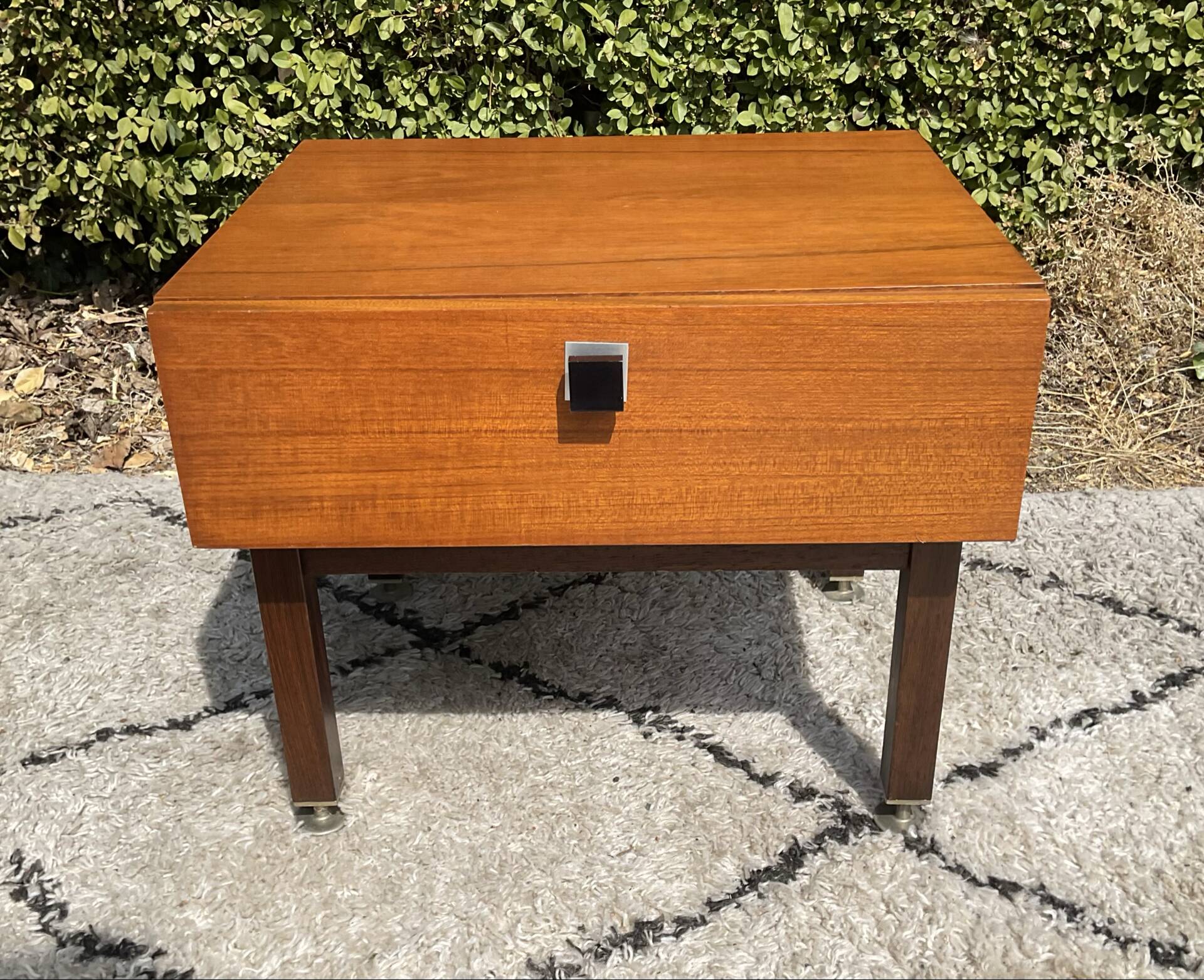 Vintage bedside table from the 60s-70s in teak.