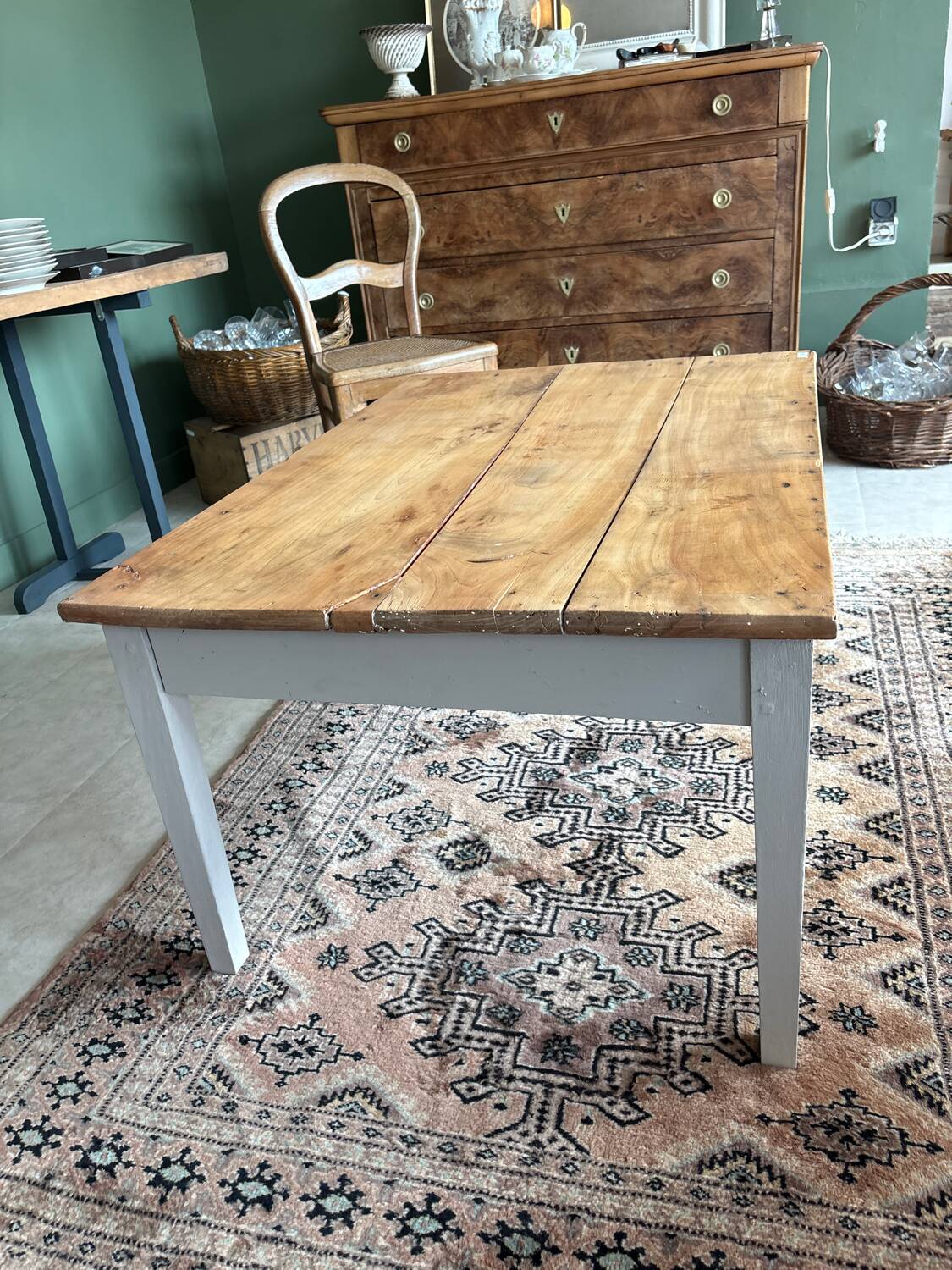 Coffee table with sandblasted top and painted legs.