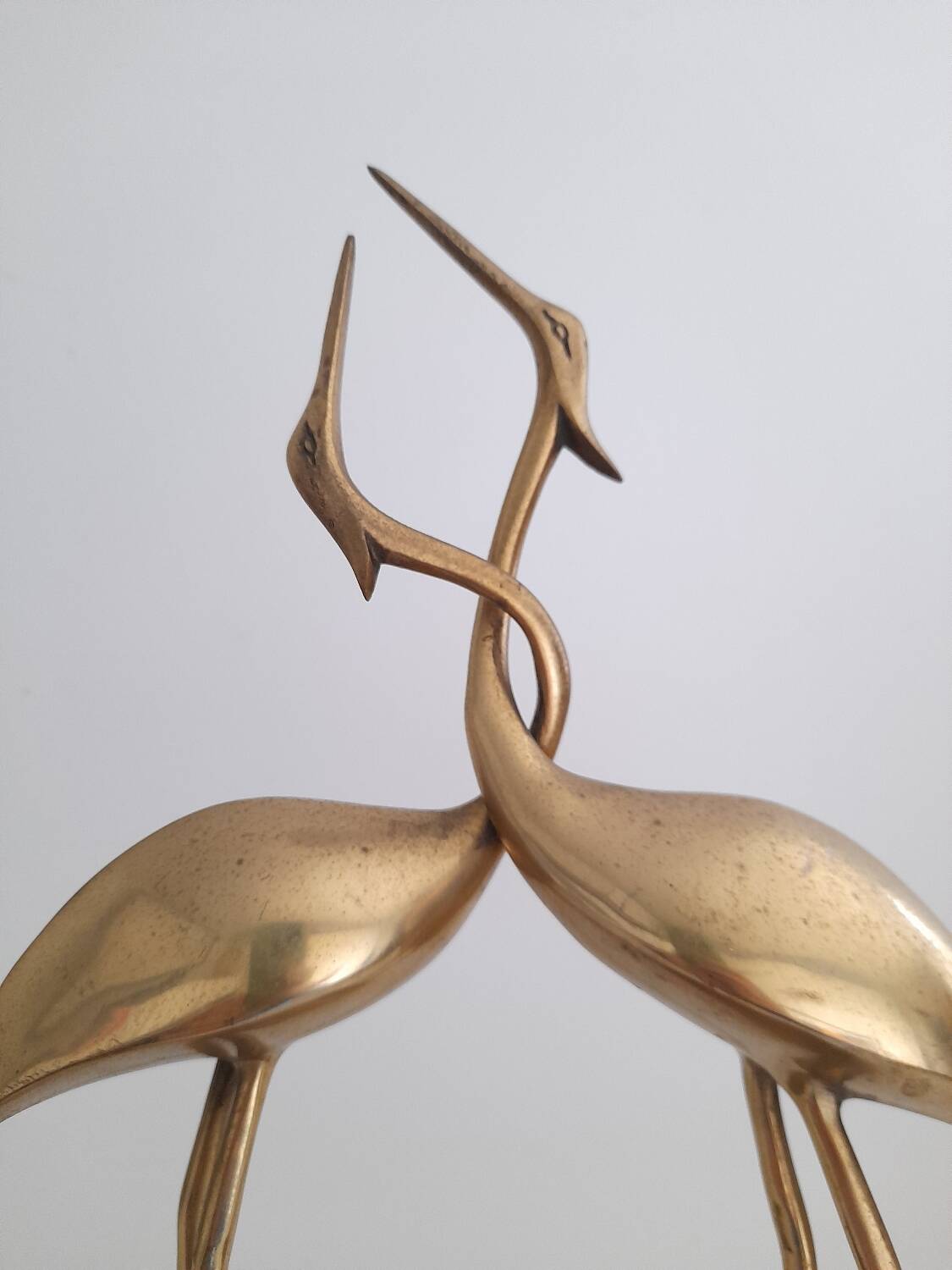 Couple of brass cranes