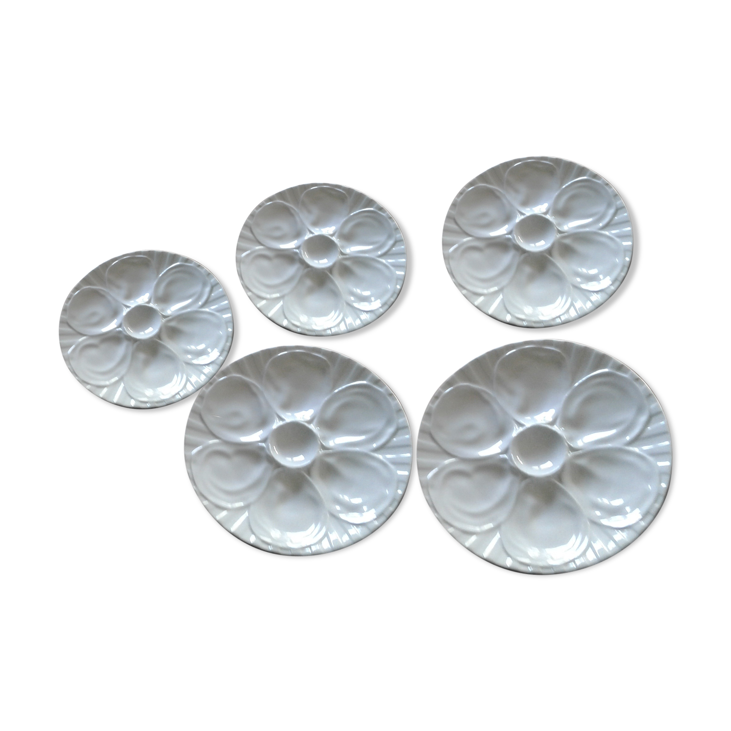 5 white slurries plates.  pillivuyt