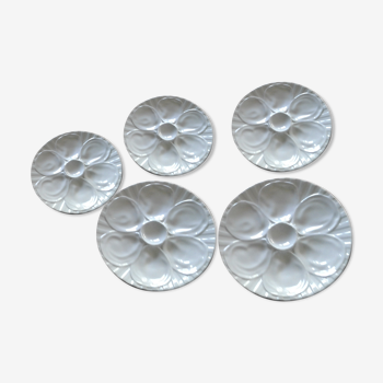5 white slurries plates.  pillivuyt