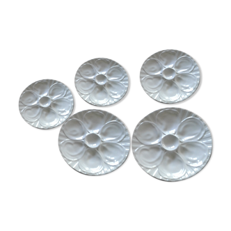 5 white slurries plates.  pillivuyt