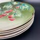 Lunéville cherry plates with golden edges