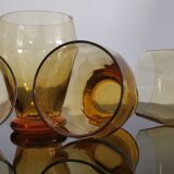 4 old amber colored glasses