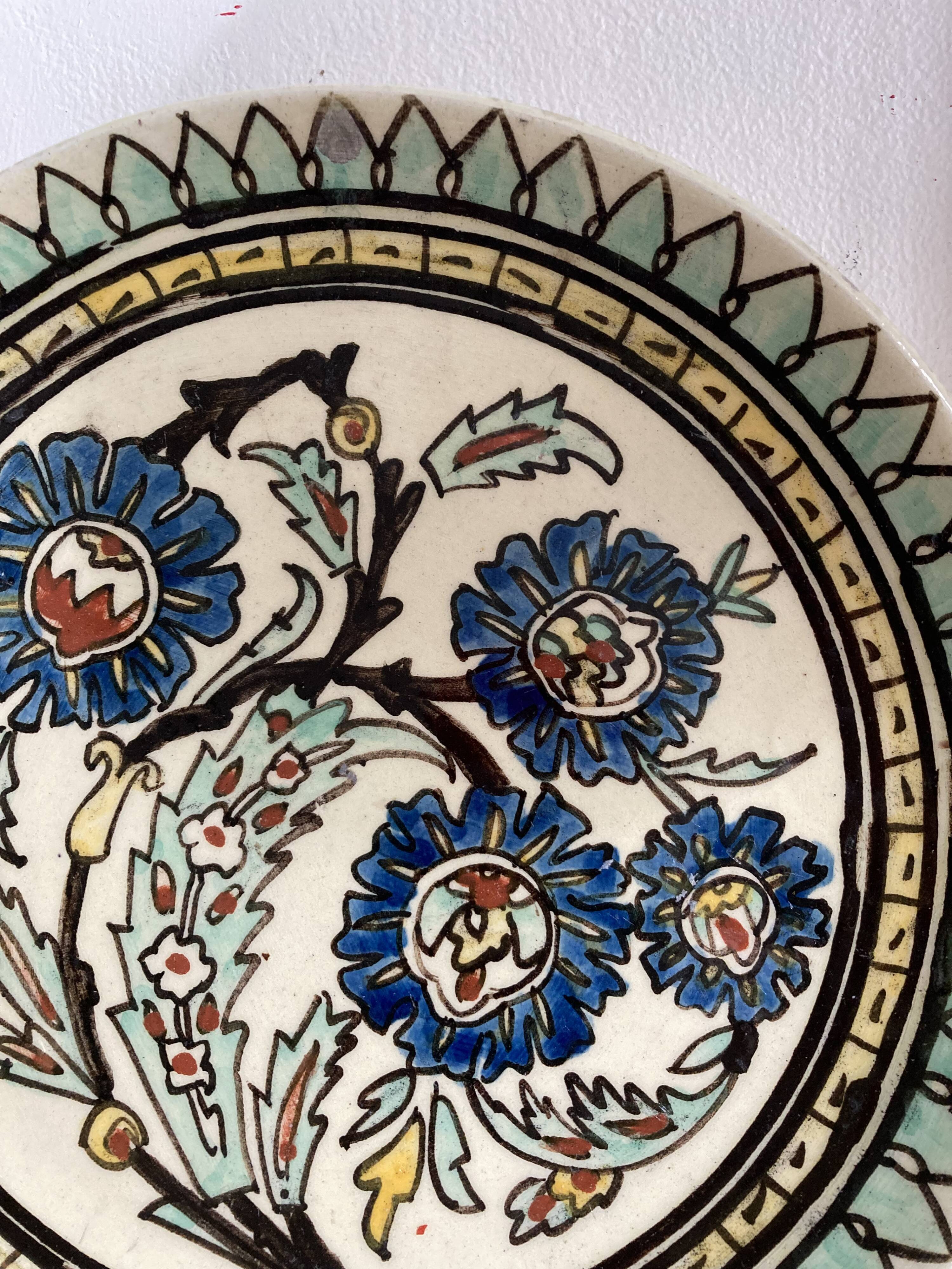 Assiette décorative à décor de fleurs vert