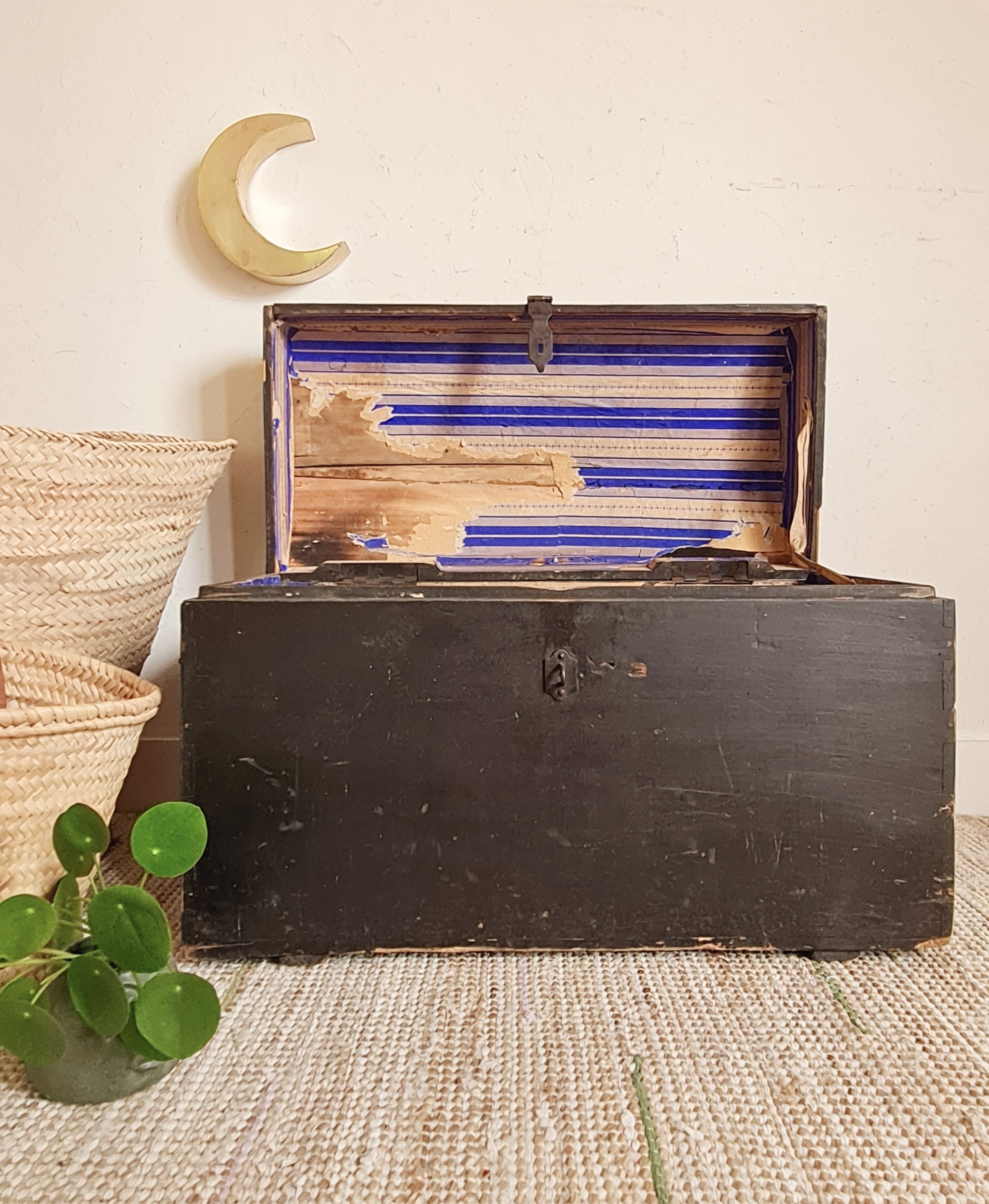 Old chest in black wood