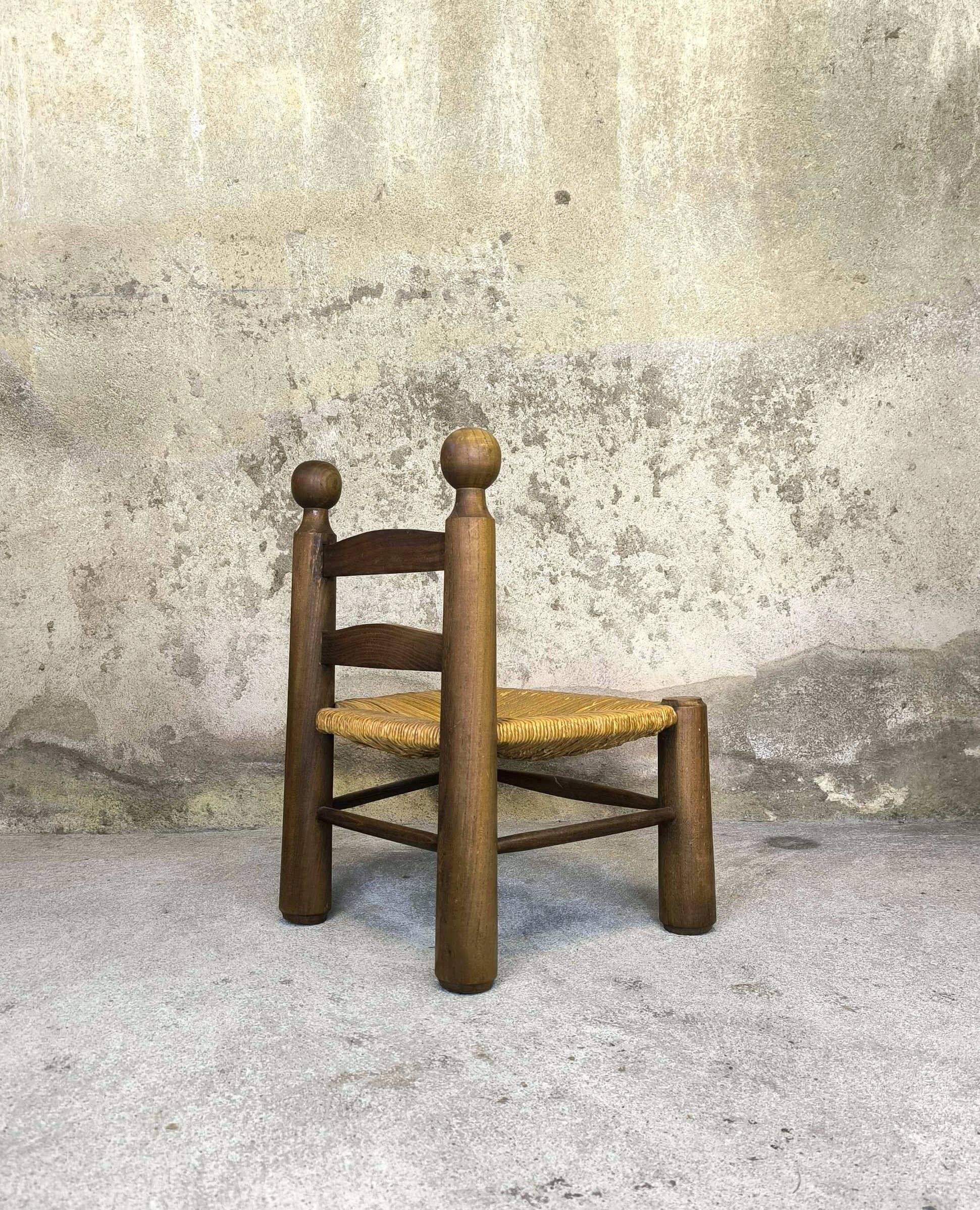 Vintage low chair in wood and straw